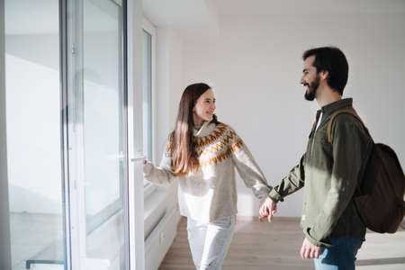 Young couple moving in new flat, new home and relocation concept.の写真素材