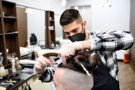Man client visiting haidresser in barber shop,  and new normal concept.の写真素材
