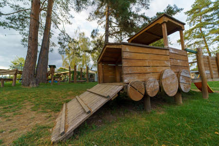 Outdoor empty wooden playground in restaurant area.の写真素材