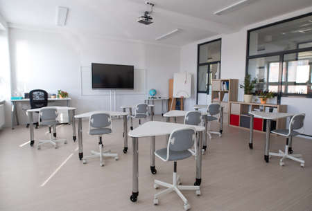 Rear view of empty classroom for at schoolの写真素材