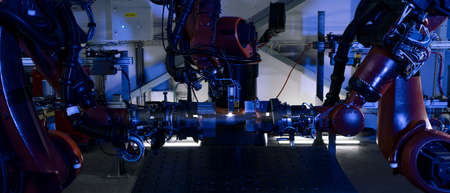 Robotic arm at industrial manufacture factory. Automated production cell.