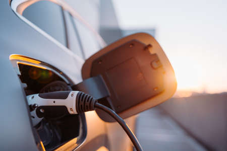 Charging an electric car, future transportation conceptの写真素材
