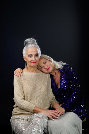 Portrait of happy senior woman friends, celebrating concept.の写真素材