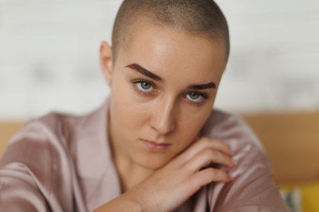 Portrait of unhappy pensive woman with cancer.の写真素材
