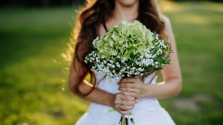 Close-up of brides bouquet, outdoor in the meadow.の写真素材