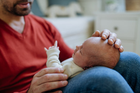 Close-up of father holding his little son.