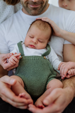 Close-up of father holding his little son.