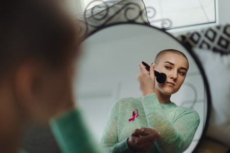Beauty routine of young woman with cancer.の写真素材