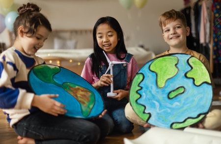 Little children talking about environmental topics in the room.の写真素材