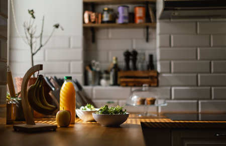 Close up of kitchen with salad and juice.の写真素材
