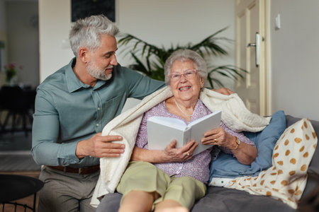 Senior woman spending nice time with his adult son, concept of relationships.の写真素材