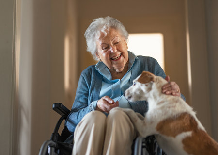 Senior woman enjoying time with her little dog.の写真素材