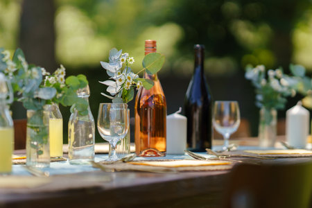 Close up shot of a set table at a summer garden party.の写真素材