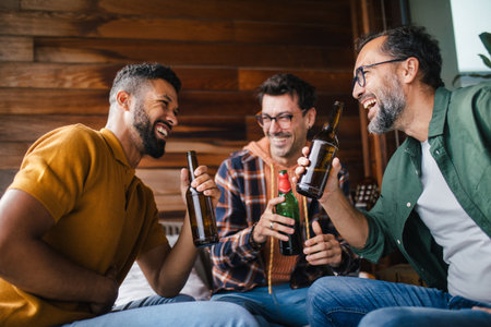 Best friends togehter, drinking beer and talking. Concept of male friendship, bromance.の写真素材