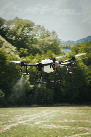 Agricultural drones spraying crops, distribute pesticides, herbicides and fertilizers efficiently...