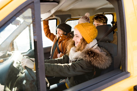 Friends going skiing at ski resort, spending the Christmas holidays together in a cabin. Driving car...