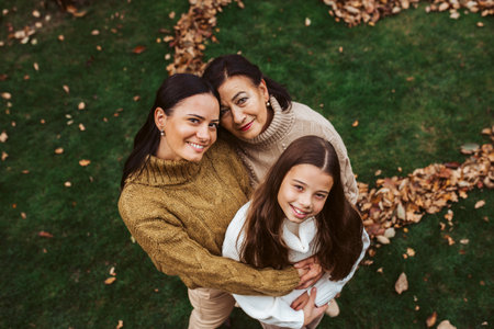 High angel view of multigenerational female family. Mature daughter, grandmother and granddaugter...