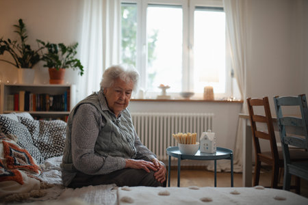 Senior woman living alone and feeling lonely.