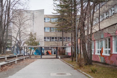 View of the exterior of a high school on cold spring day.