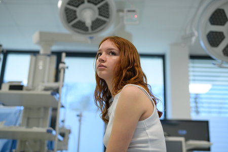 Teenage girl waiting in hospital.