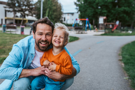 Portrait of dad and child enjoying time togetherの写真素材