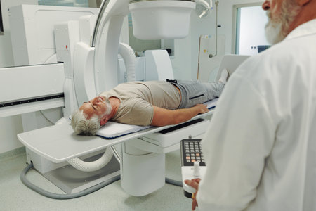 Male patient undergoing CT scan examination in hospital.の写真素材