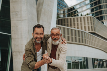 Portrait of handsome mature man and his older father.の写真素材