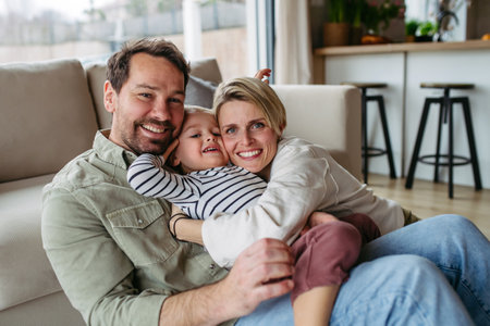 Family bonding moment with young children.の写真素材