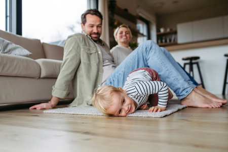 Happy family playing together at home.の写真素材