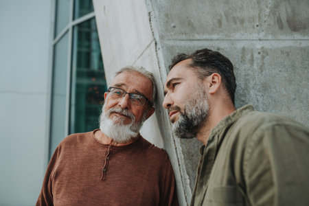 Portrait of handsome mature man and his older father.の写真素材