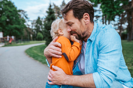 Portrait of dad and child enjoying time togetherの写真素材