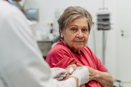 Close up of elderly patient after vaccination.の写真素材