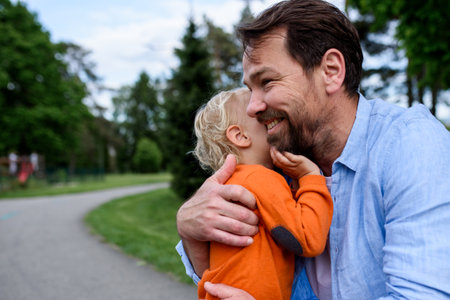 Portrait of dad and child enjoying time togetherの写真素材