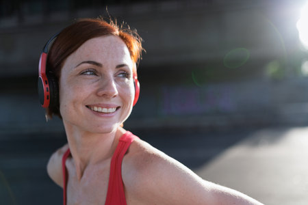 Sporty woman runner preparing for morning running workout.の写真素材