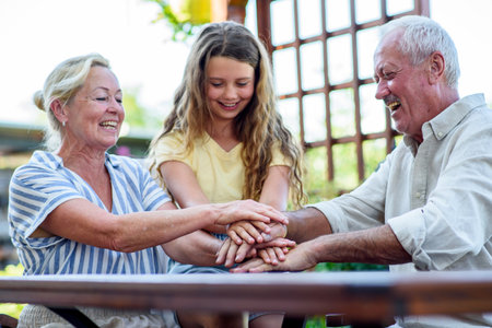 Family bonding with teamwork gesture.