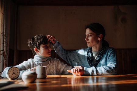 Single mother with her child during hard times.の写真素材