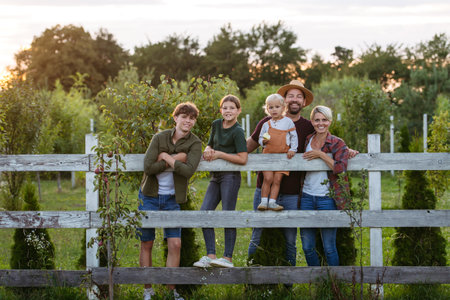 Farmer family portrait. Parents with three kids.の写真素材