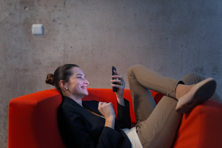 Tired businesswoman working on tablet.の写真素材