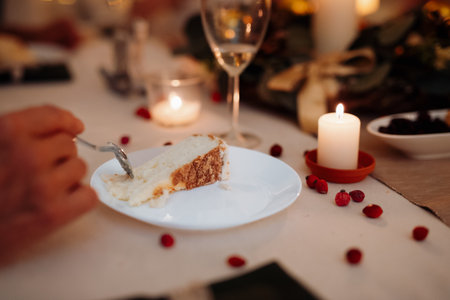 Close up of eating cake during dinner.の写真素材