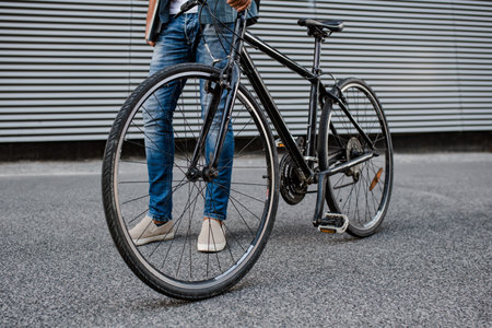 City commuter riding bike on street.の写真素材