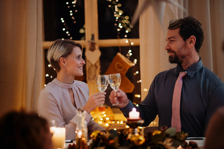 Christmas toast with white wine.の写真素材