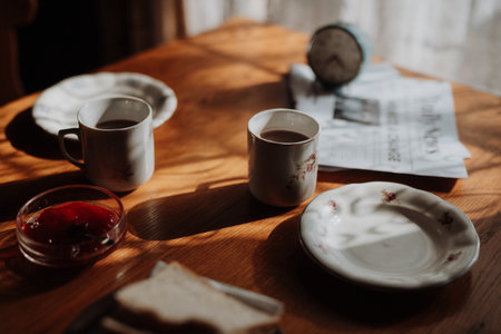Vintage breakfast moment in natural light.の写真素材