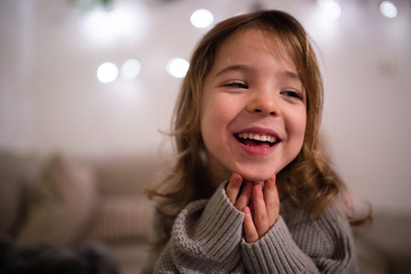 Portrait of beautiful laughing girl.