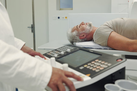 Doctor operationg CT machine in hospital.の写真素材