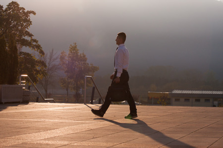 Young beautiful ambitious business man silhouetteの写真素材
