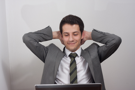 Portrait of handsome young male businessman in suitの写真素材