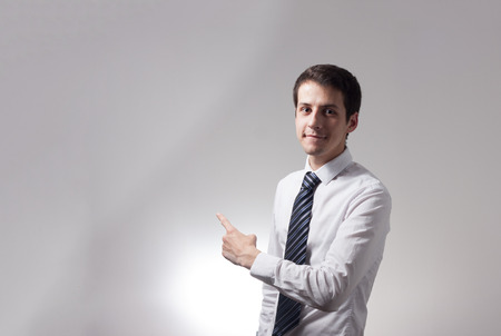 Portrait of handsome young male businessman in suitの写真素材