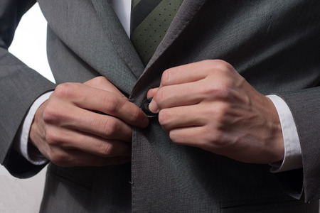 Portrait of handsome young male businessman in suitの写真素材