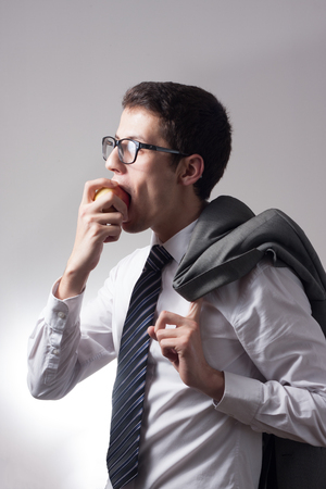 Portrait of handsome young male businessman in suitの写真素材