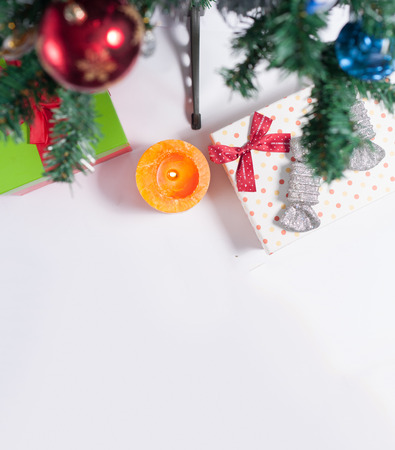 Christmas tree decorated with ornaments and giftsの写真素材